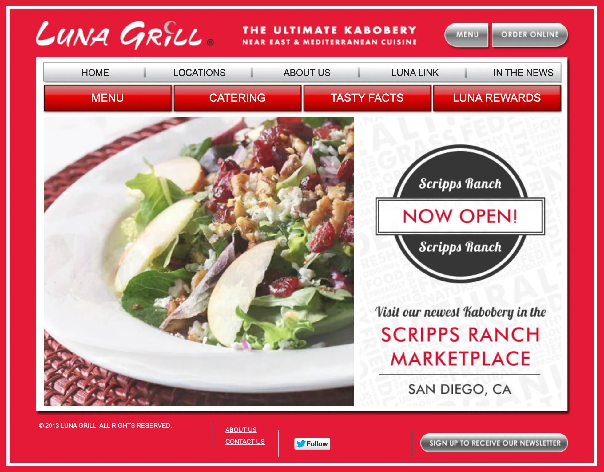 The 2013 lunagrill.com homepage, set in red with a brush script logo