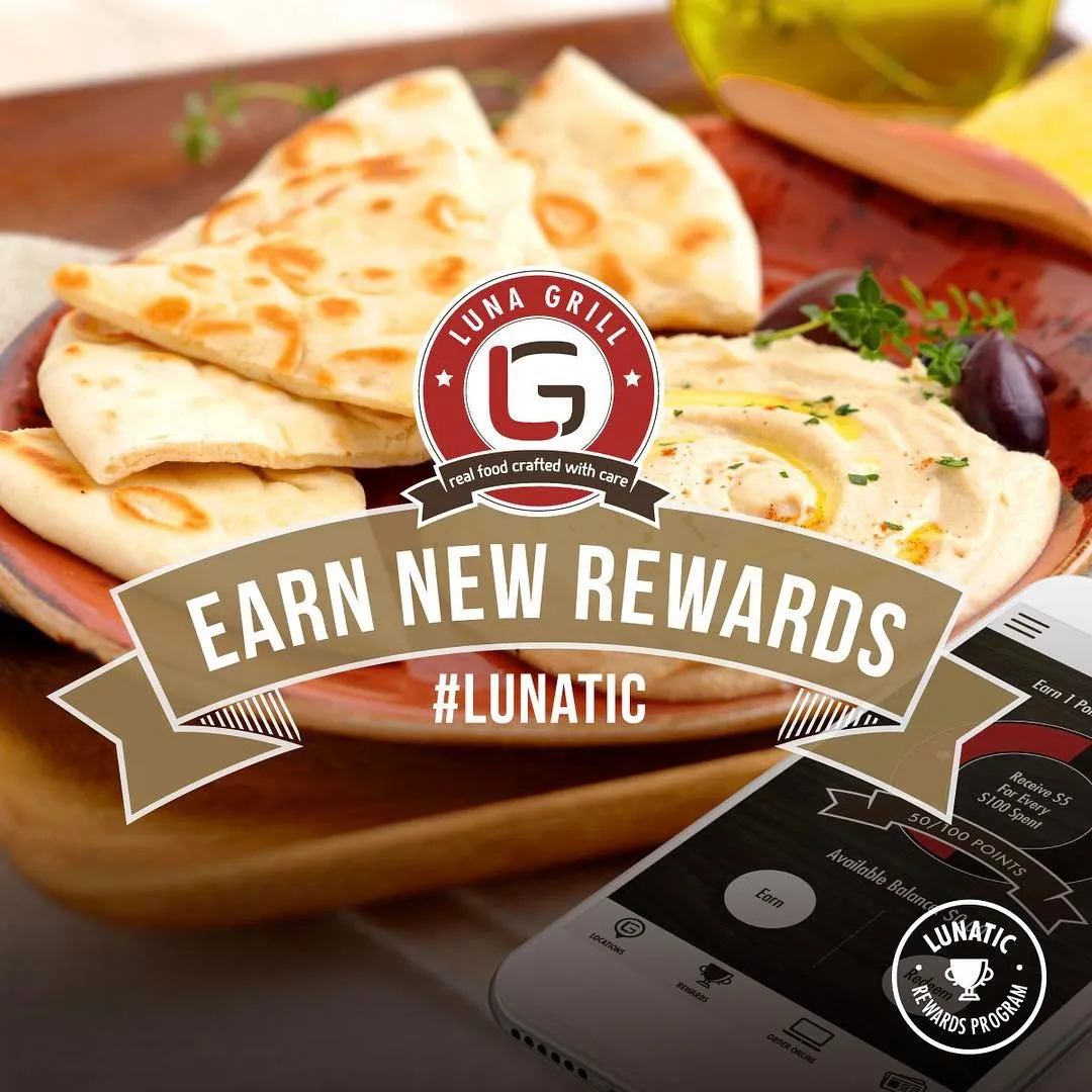 A rewards graphic reading earn new rewards over a plate of food