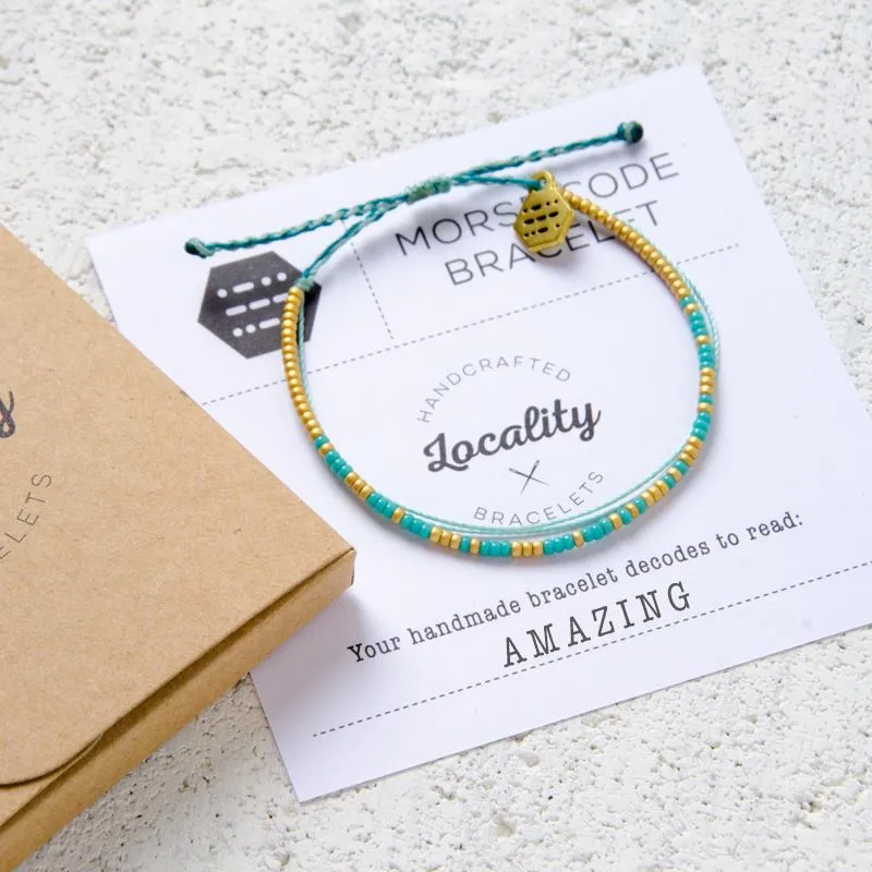 A Locality unboxing with the bracelet and insert cards laid out on the box.